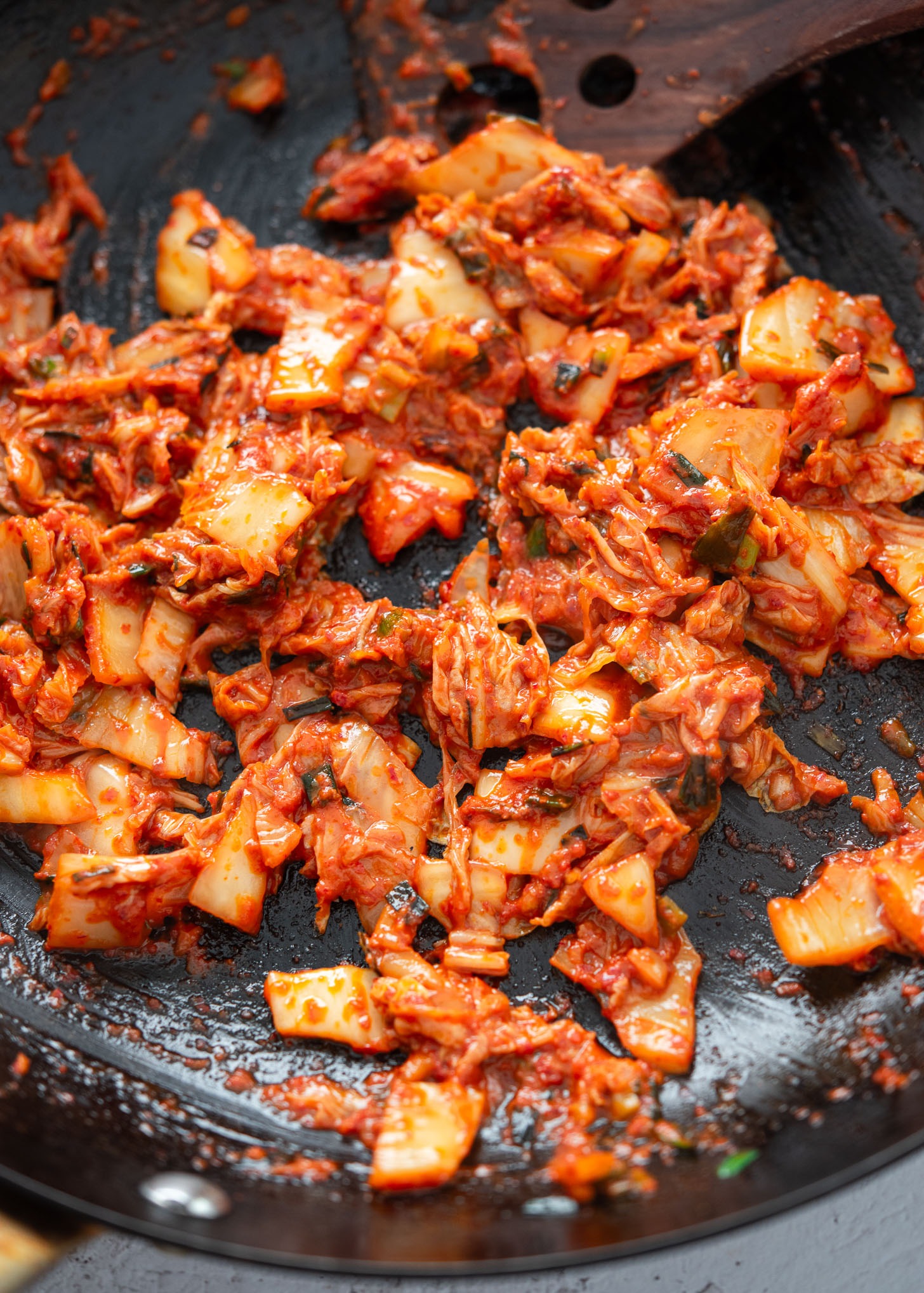 Kimchi cooking down in infused oil