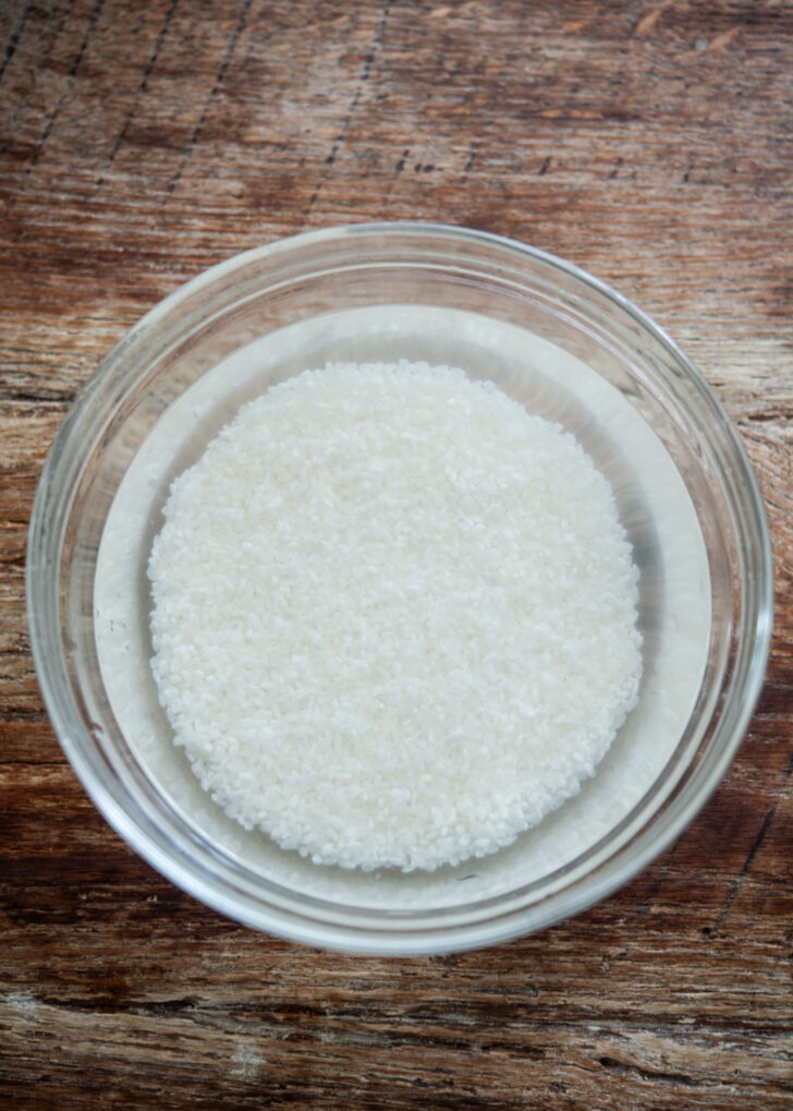 Korean short-grain rice soaking in a bowl of water
