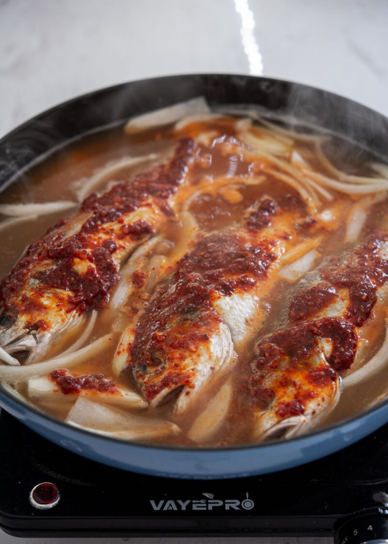 Croaker coated with spicy seasoning in Korean fish stew