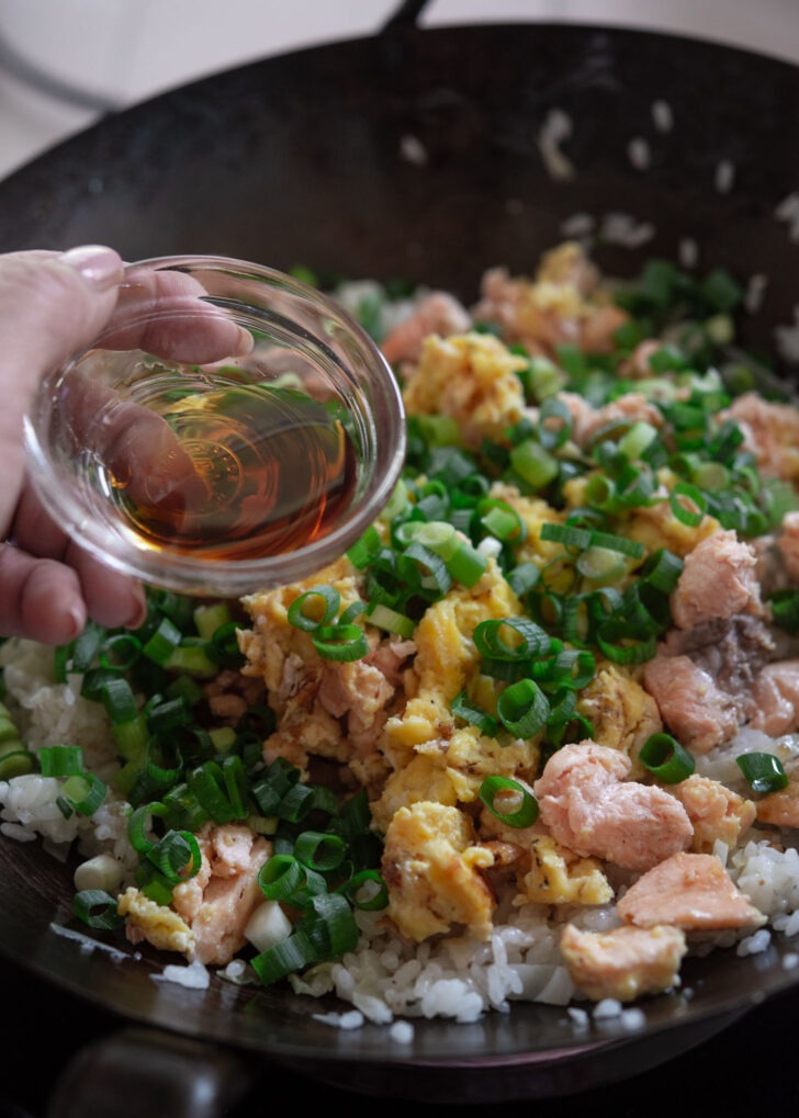 Tsuyu added to fried rice, salmon and green onion and sesame seeds