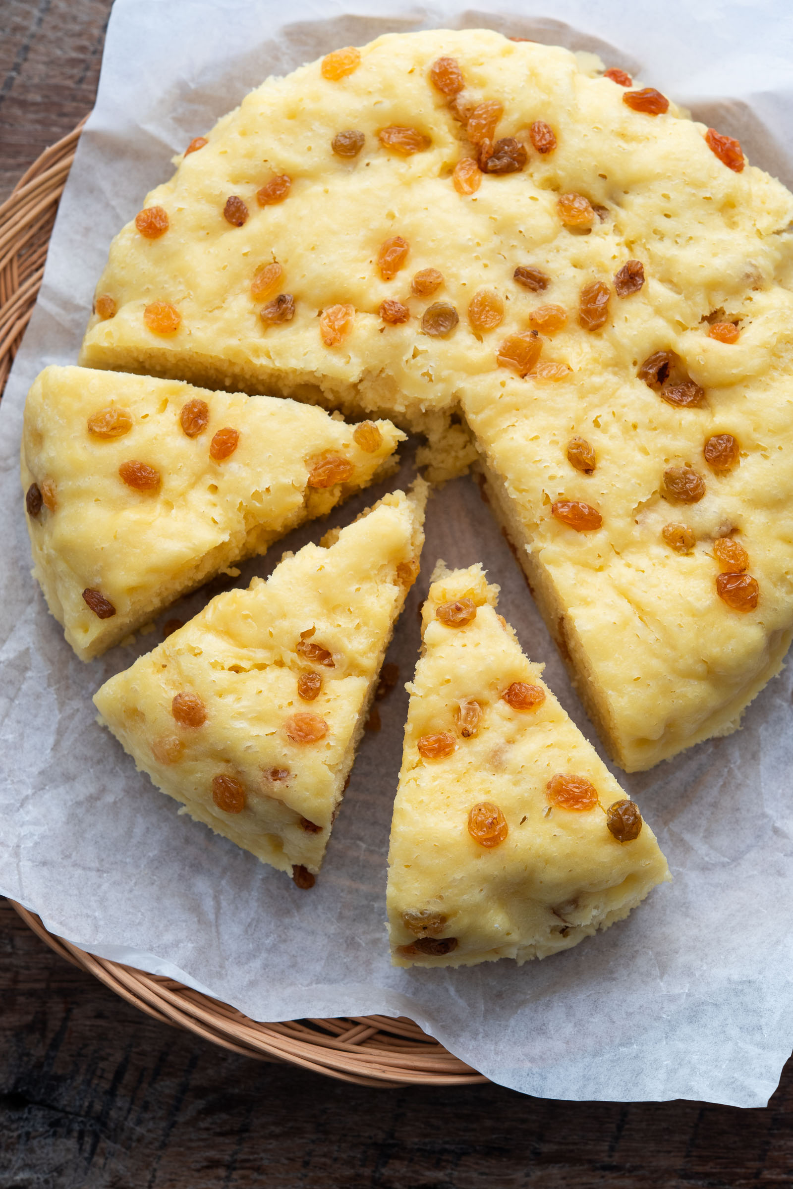 Korean sulppang makgeolli bread sliced into wedges with raisins on top