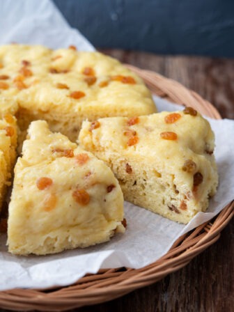 Korean sulppang makgeolli bread sliced to show soft airy texture with raisins