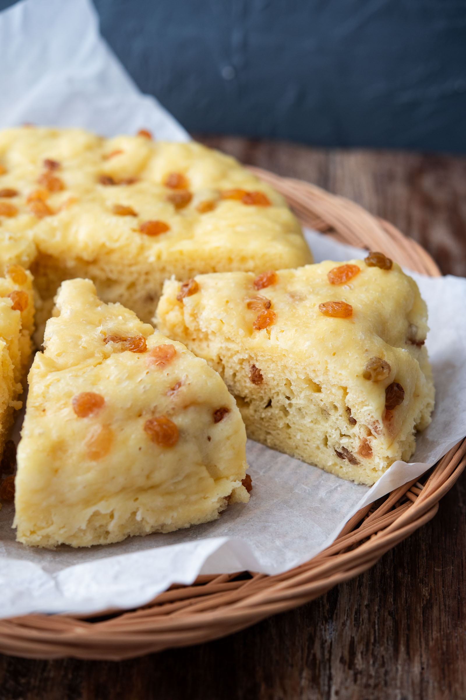 Korean sulppang makgeolli bread sliced to show soft airy texture with raisins