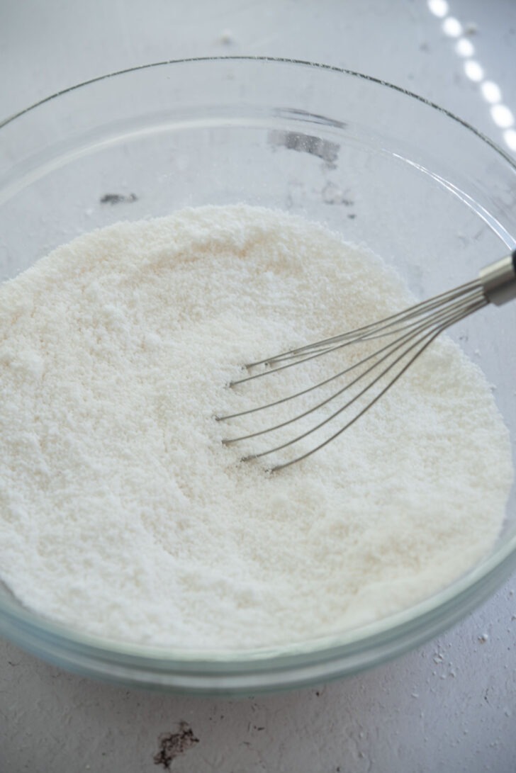 whisking rice flour with sugar and salt