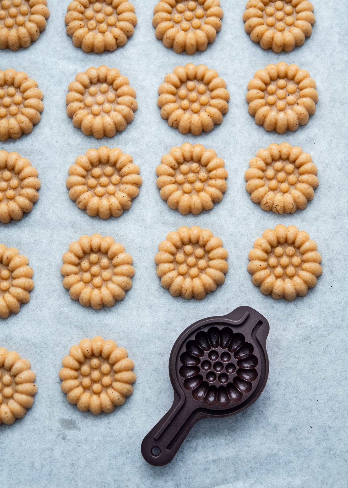 Yakgwa dough pieces shaped with a mold