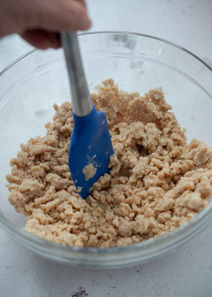 Mixing the yakgwa dough with a spatula