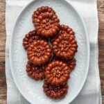 Yakgwa Korean honey cookies arranged on a white plate