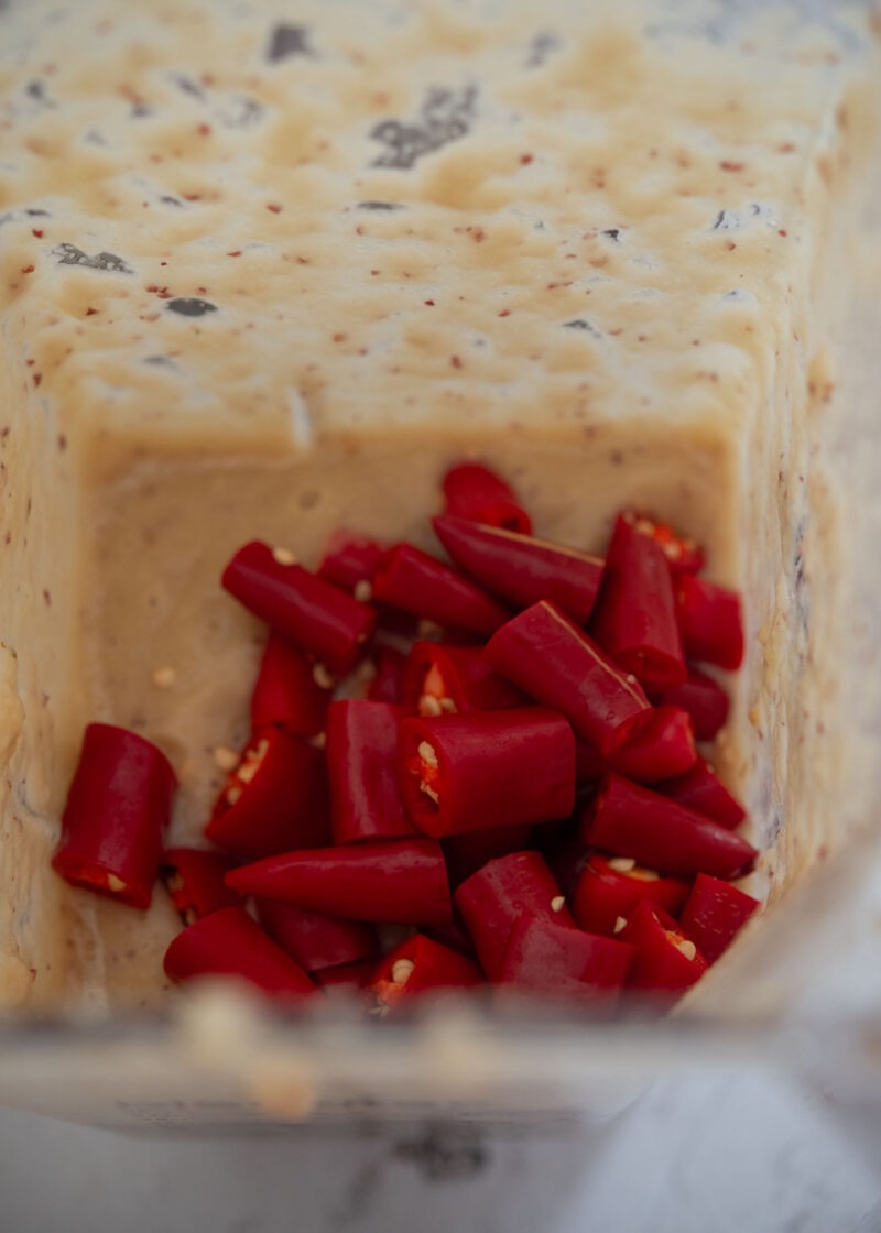 Fresh red chili added to kimchi seasoning puree for yeolmu kimchi