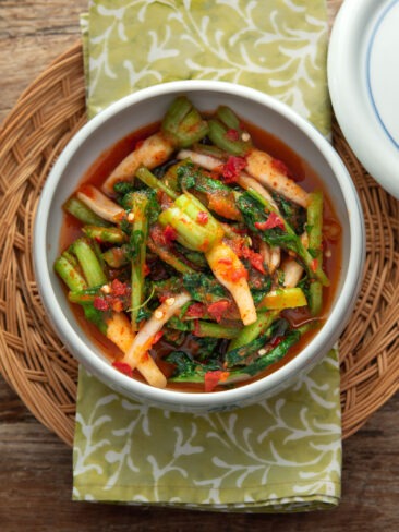 Yeolmu kimchi made with young Korean radish greens in light spicy brine, served in a bowl