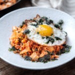 Classic kimchi fried rice topped with a sunny-side-up egg and roasted seaweed crumble