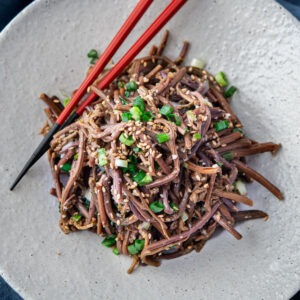gosari namul (Korean fernbrake) topped with sesame seeds and green onion
