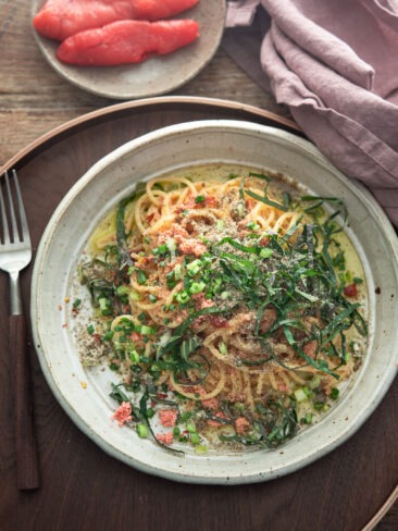 Mentaiko pasta made with Korean pollock fish roe, topped with green onion and perilla leaves