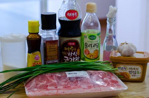 Ingredients for making Korean doenjang marinated pork are shown.