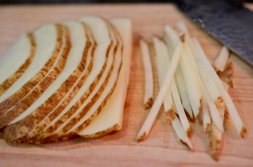Potato is sliced thinly than cut into matchsticks.