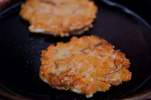 Korean Mung bean Pancakes are pan-fried to golden and crisp on the surface in a skillet.