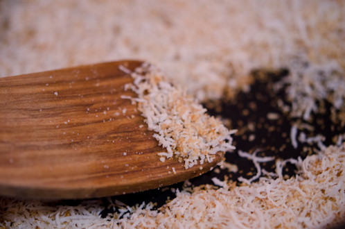 Toasting grated coconut.
